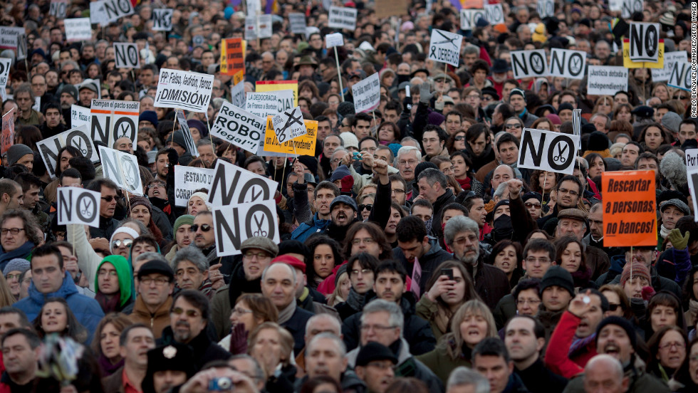 Demonstrators shout slogans at Neptuno Square during a march made by thousands of people on Saturday, February 23 in Madrid.