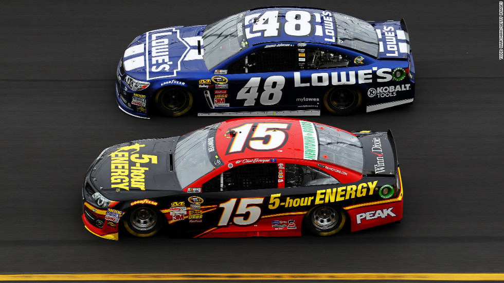 No. 48 Jimmie Johnson races neck and neck with No. 15 Clint Bowyer.