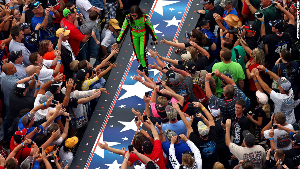 Danica Patrick greets the crowd during driver introductions before the start of the Daytona 500.