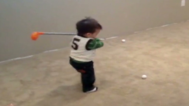 Distraction: Tiny golf prodigy