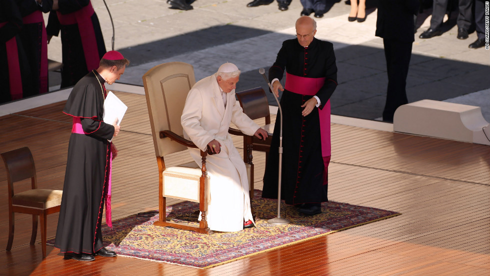 Benedict takes his seat on the dias in St. Peter&#39;s Square. In an unusually personal message, he said there had been &quot;many days of sunshine&quot; but also &quot;times when the water was rough ... and the Lord seemed to sleep.&quot;