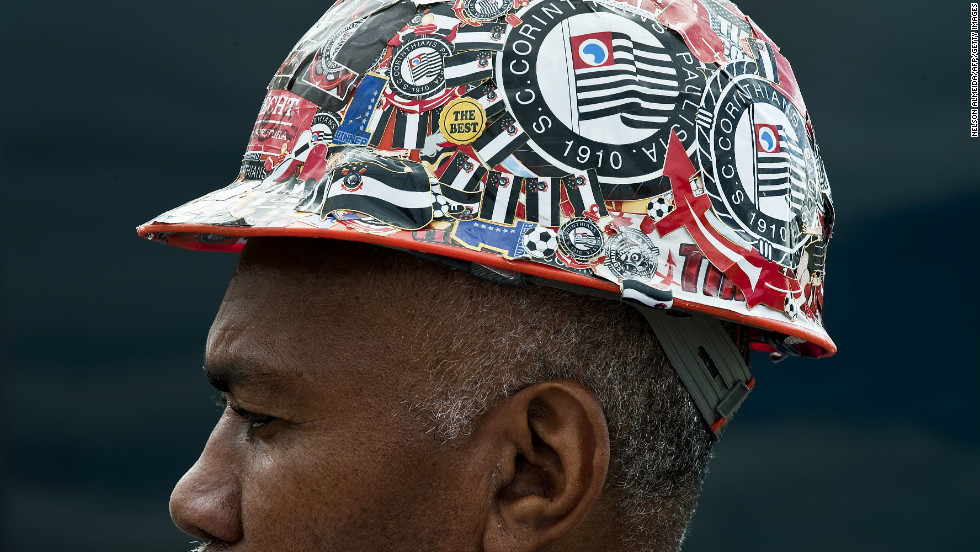 A construction worker at the site of the Itaquerao football stadium which will host the opening football matches of the FIFA World Cup 2014 in Sao Paulo, Brazil.