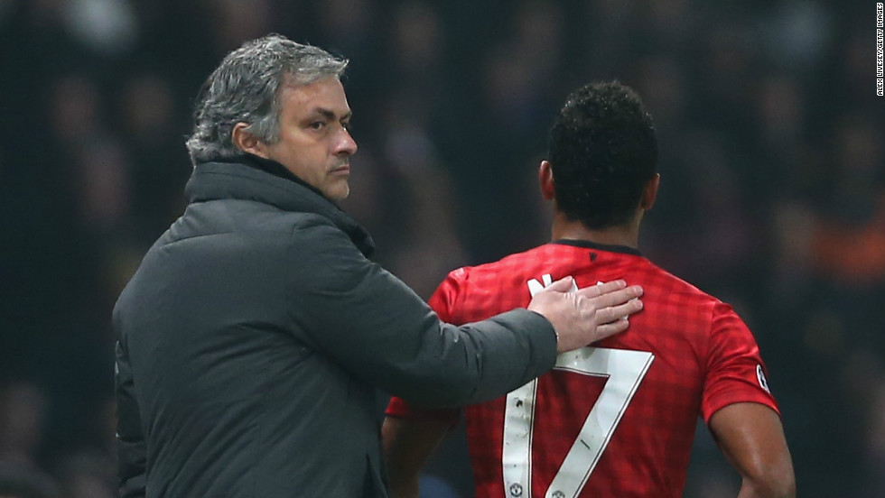 Real manager Mourinho consoles Nani after the Portuguese international is red carded at Old Trafford.