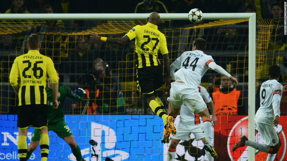 Felipe Santana rises to score Borussia Dortmund&#39;s opening goal in their 3-0 home win over Shakhtar Donetsk. 