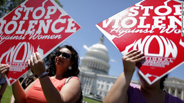 Members of women&#39;s groups hold a rally on Capitol Hill in support of reauthorizing the Violence Against Women Act in June 2012.