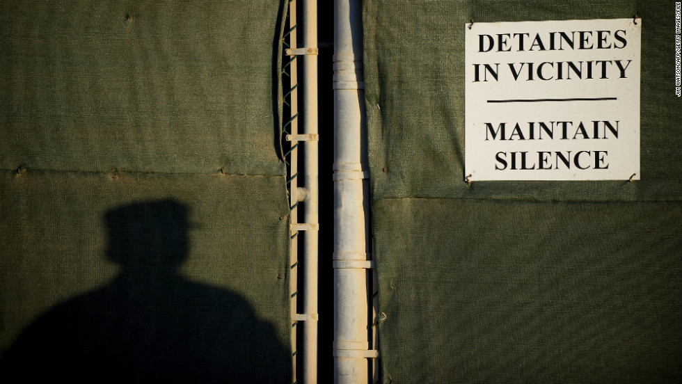 A soldier stands near the fence line in January 2012. 