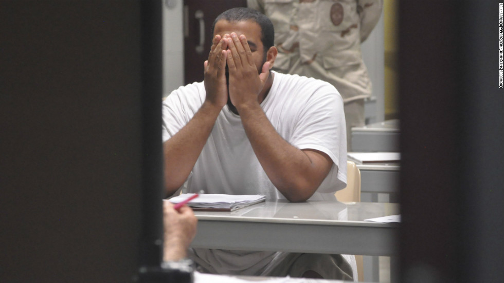 A detainee rubs his face while attending a &quot;life skills&quot; class in April 2009. 