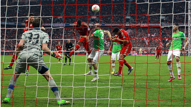 Jerome Boateng heads Bayern Munich to victory against Dusseldorf at the Allianz Arena on Saturday. 