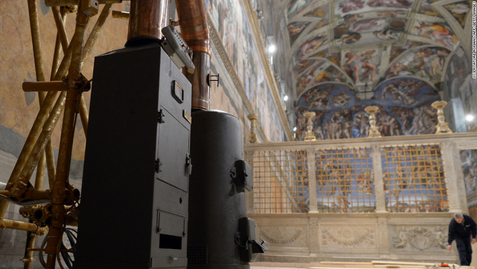 The stoves that will signal the outcome of papal voting are installed inside the Sistine Chapel at the Vatican on March 8.
