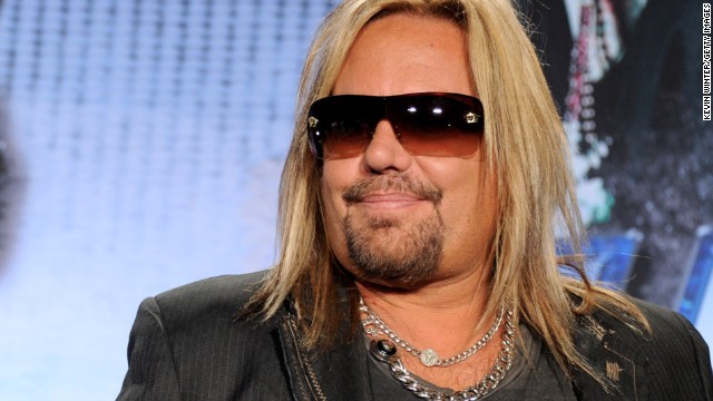 Singer Vince Neil, seen here in March 2012, had to walk off stage because of pain from kidney stones.