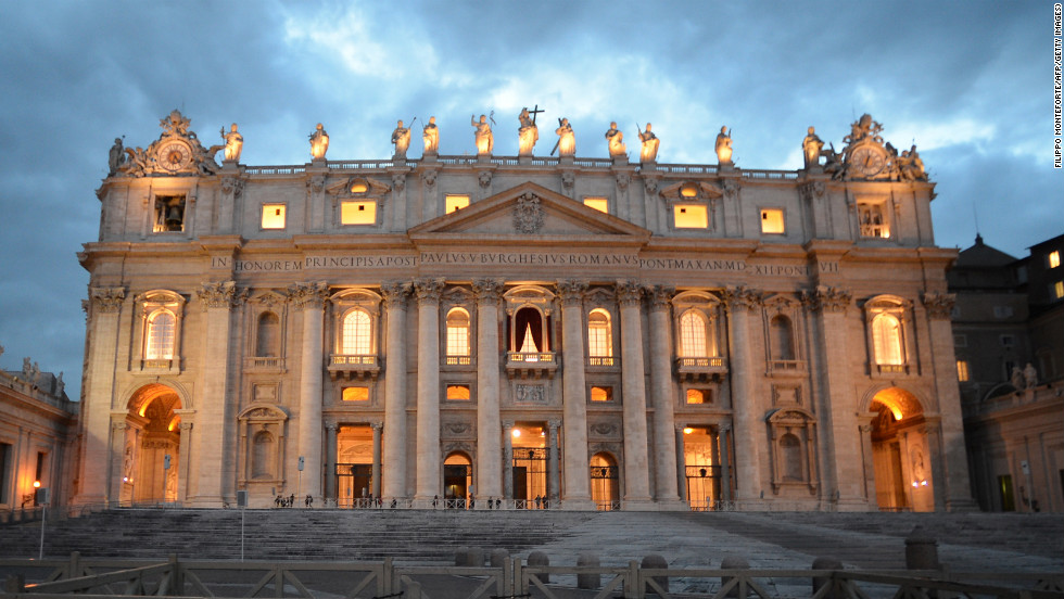 St. Peter&#39;s Basilica is seen at sunset on the eve of the conclave on March 11.