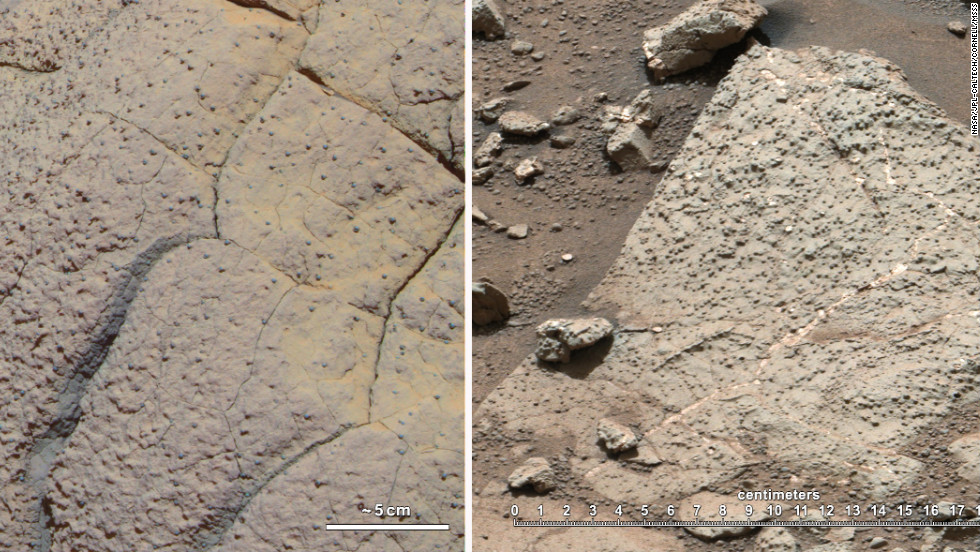 The rock on the left, called &quot;Wopmay,&quot; was discovered by the rover Opportunity, which arrived in 2004 on a different part of Mars. Iron-bearing sulfates indicate that this rock was once in acidic waters. On the right are rocks from &quot;Yellowknife Bay,&quot; where rover Curiosity was situated. These rocks are suggestive of water with a neutral pH, which is hospitable to life formation.