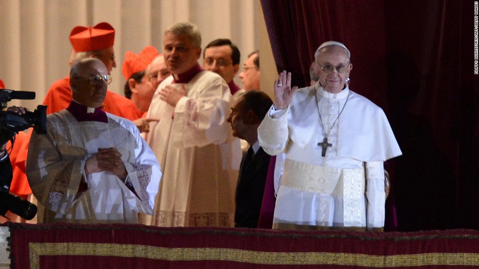 Pope Francis, the Argentinian Cardinal Jorge Mario Bergoglio, appears on the St. Peter&#39;s Basilica&#39;s balcony after being elected the 266th pope of the Roman Catholic Church on Wednesday, March 13, at the Vatican.