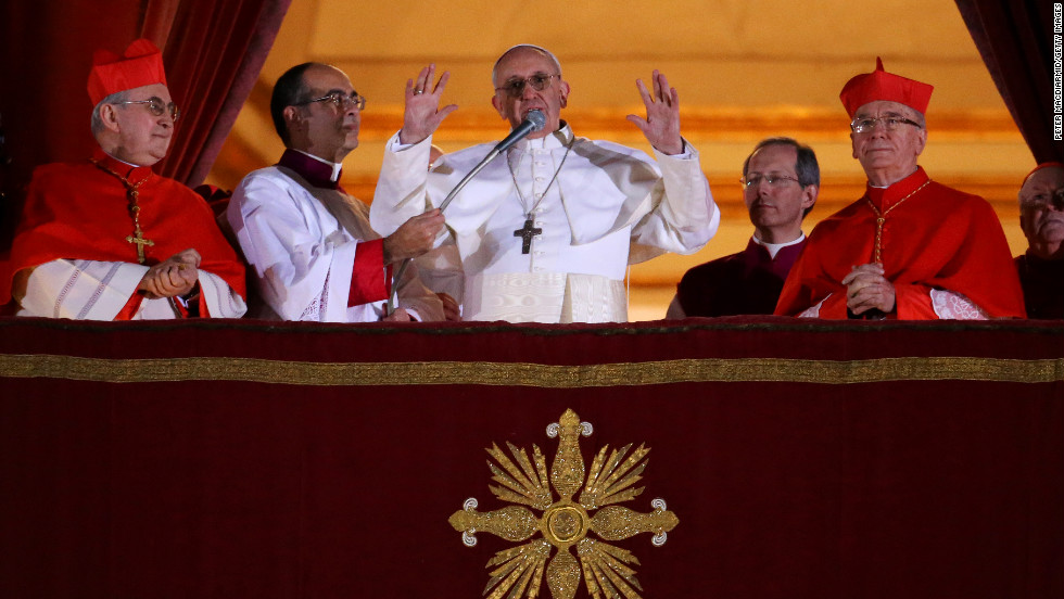 Newly elected Pope Francis speaks to the crowd from the central balcony of St. Peter&#39;s Basilica at the Vatican on Wednesday, March 13. Argentinian Cardinal Jorge Mario Bergoglio was elected as the first pontiff from Latin America and will lead the world&#39;s 1.2 billion Catholics.