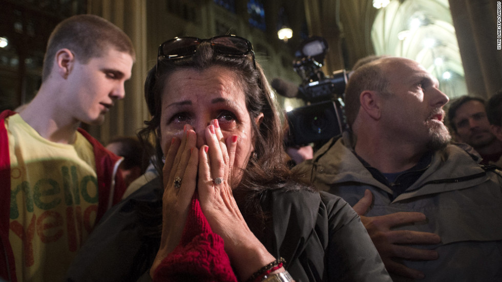 Shelly Guadelupe of Puerto Rico cries at St. Patrick&#39;s Cathedral in New York.