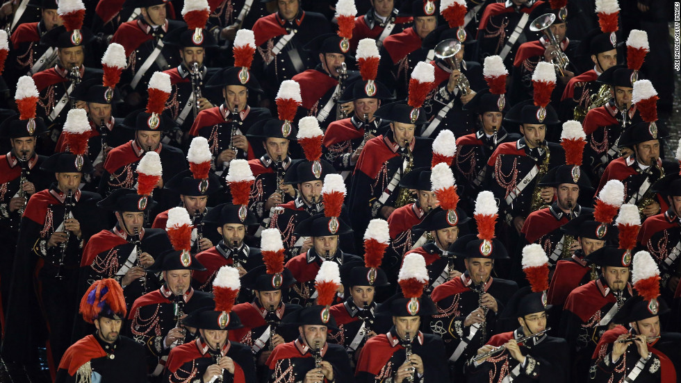 A marching band performs before the introduction of the new pope.