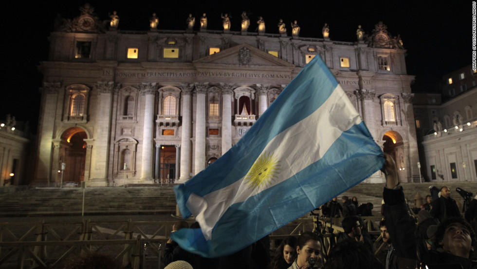 People in St. Peter&#39;s Square wave Argentina&#39;s flag after the new pope was chosen.