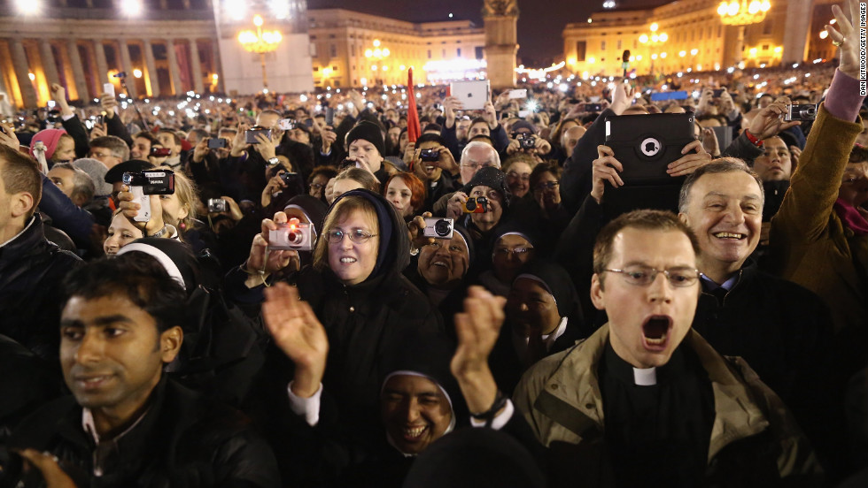 People react to the newly elected pope&#39;s appearance on the balcony.