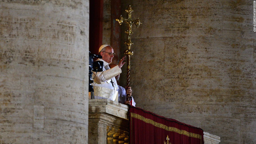 Pope Francis waves to the crowd.