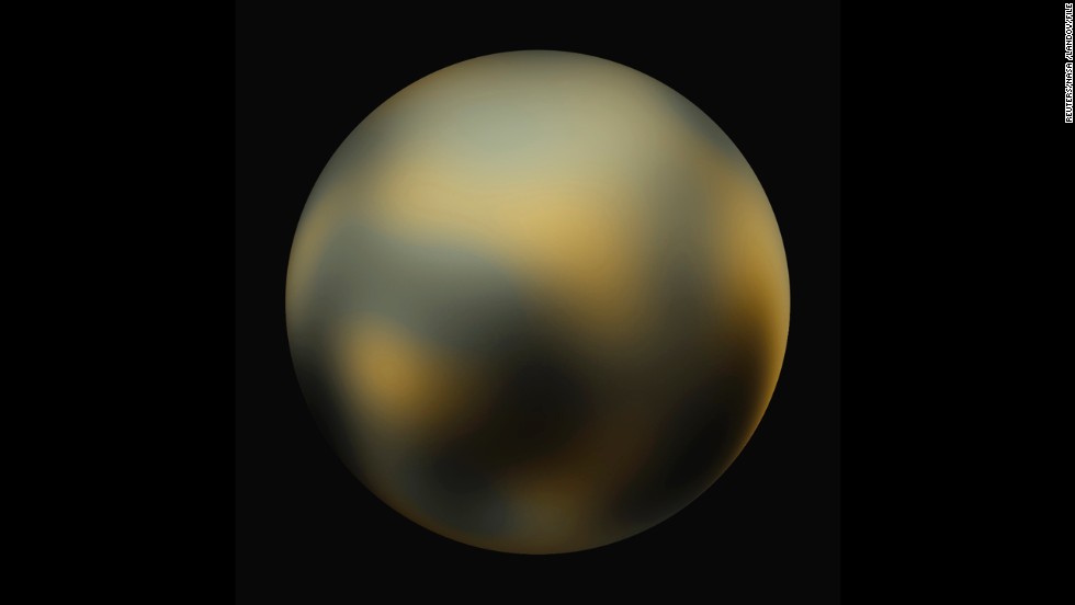 This image shows the surface of Pluto as constructed from multiple NASA Hubble Space Telescope photographs.  Although deemed a planet at its discovery in 1930, scientists decided later to reclassify it as a &quot;dwarf planet.&quot;