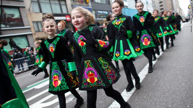 Young girls don Irish-inspired dresses as they participate in New York City&#39;s annual St. Patrick&#39;s Day Parade on March 16.