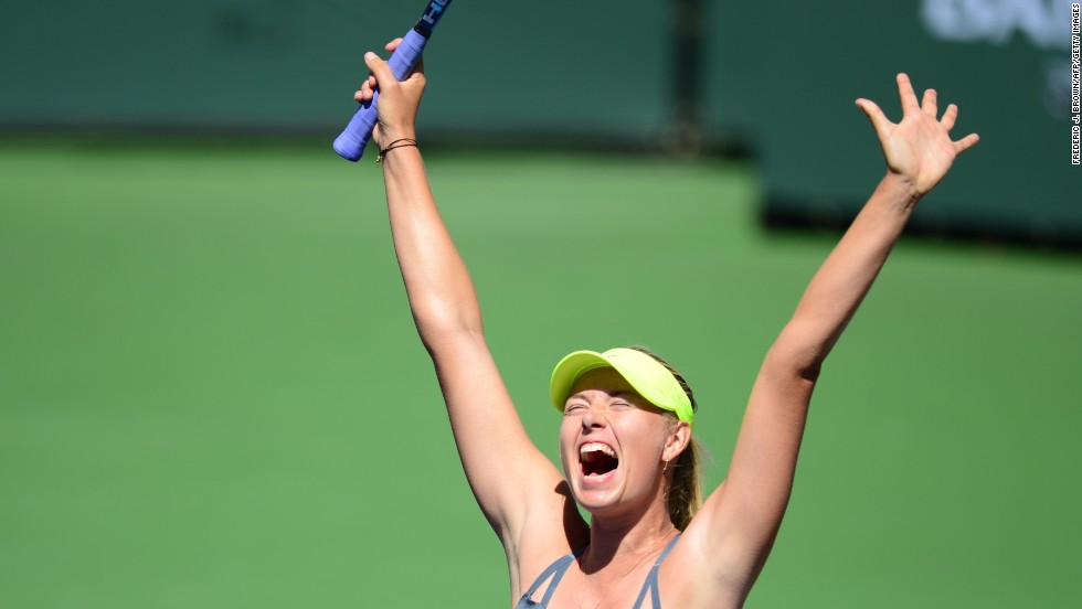Sharapova celebrates after winning the title in just 81 minutes -- it was her first triumph since the 2012 French Open.