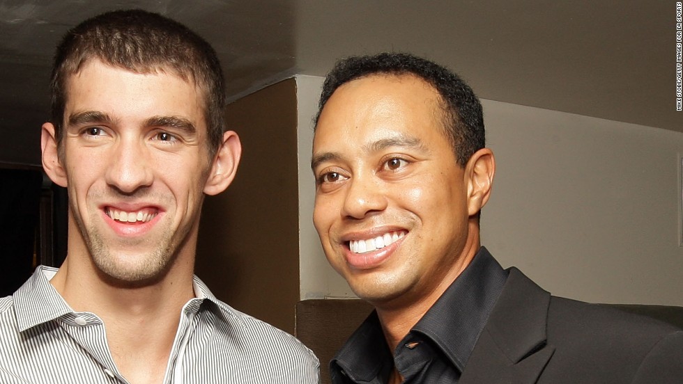 Phelps, who won a record 18 gold medals in Olympic competition, has been working with the former coach of golf superstar Tiger Woods (right). 