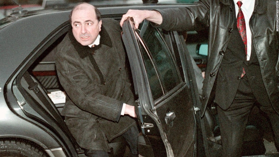 Boris Berezovsky began his working life as a math professor, and then a systems analyst, before switching to more lucrative jobs, according to CNN&#39;s Jill Dougherty. He is pictured here at Moscow airport in 1999.