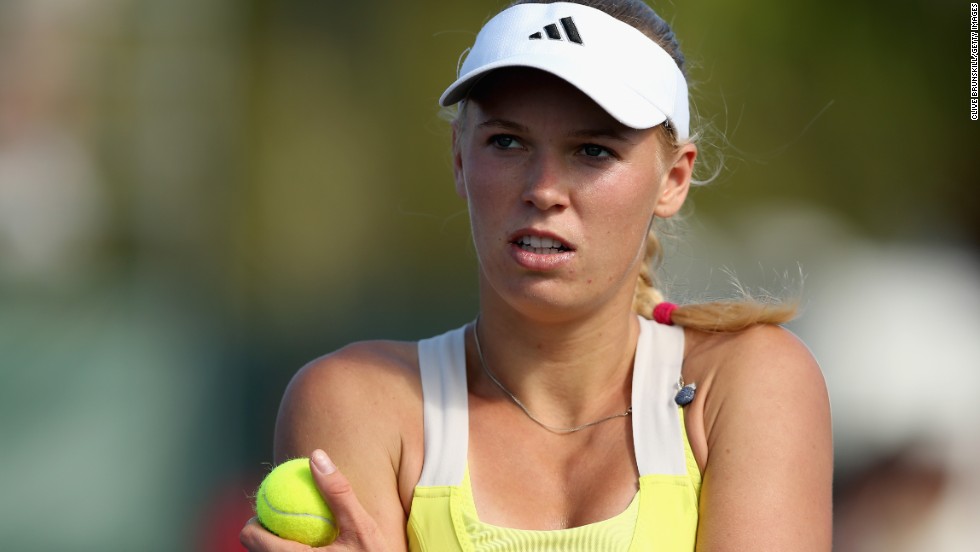 World No.9 Caroline Wozniacki suffered a shock defeat by Spain&#39;s Garbine Muguruza -- a woman ranked 64 places below the Dane.  Muguruza needed just 81 minutes to claim a 6-2 6-4 win and leave her opponent stunned.