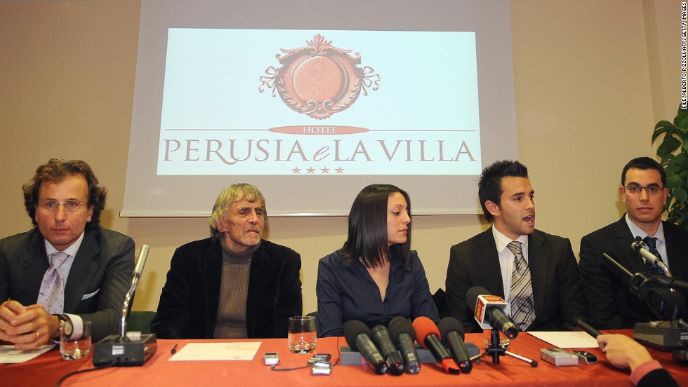 Meredith Kercher&#39;s family lawyer Francesco Maresca, left, argued in court in 2011 that the multiple stab wounds implied more than one aggressor killed Kercher. Pictured from left are Maresca, Kercher&#39;s father John, sister Stephanie, brother Lyle and brother John at a press conference in 2008.