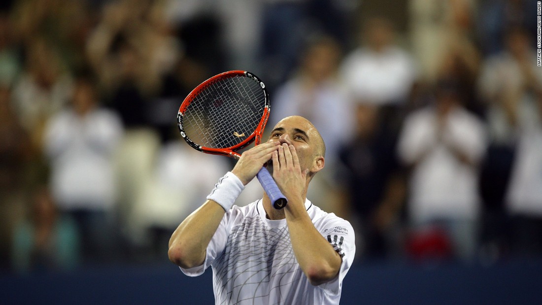 Agassi blows kisses to the crowd after winning his first round match at the 2006 U.S. Open. But he would retire from the sport at the age of 36 after losing to Germany&#39;s Benjamin Becker in the third round.