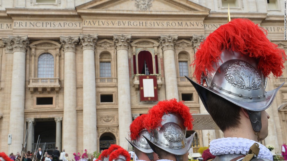 Swiss guards stand in St. Peter&#39;s Square before the Easter celebrations at the Vatican on Sunday, March 31. Pope Francis led his first Easter Sunday celebrations with a Mass marking the holiest day in the Christian calendar.