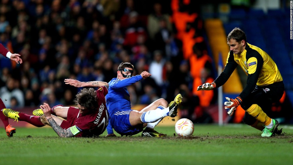 Fernando Torres, wearing his protective mask,  fired Chelsea ahead after 16 minutes against Rubin Kazan as the home side took control of the first leg at Stamford Bridge. Victor Moses then added a second 16 minutes later.