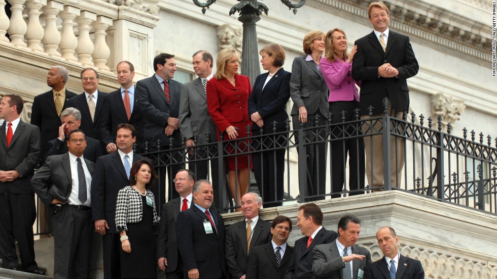 Newly elected US representatives — including Giffords, second from top right — prepare for a freshman class picture on the House steps in 2006. Giffords, a Democrat, represented Arizona&#39;s 8th District from 2007 until her resignation in 2012.