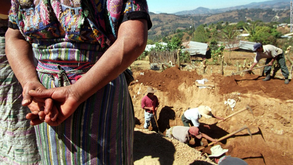 In March 2002, archaeologists in Xiquin Senai, Guatemala, exhume people&#39;s remains from a massacre that is alleged to have taken place during the country&#39;s civil war.