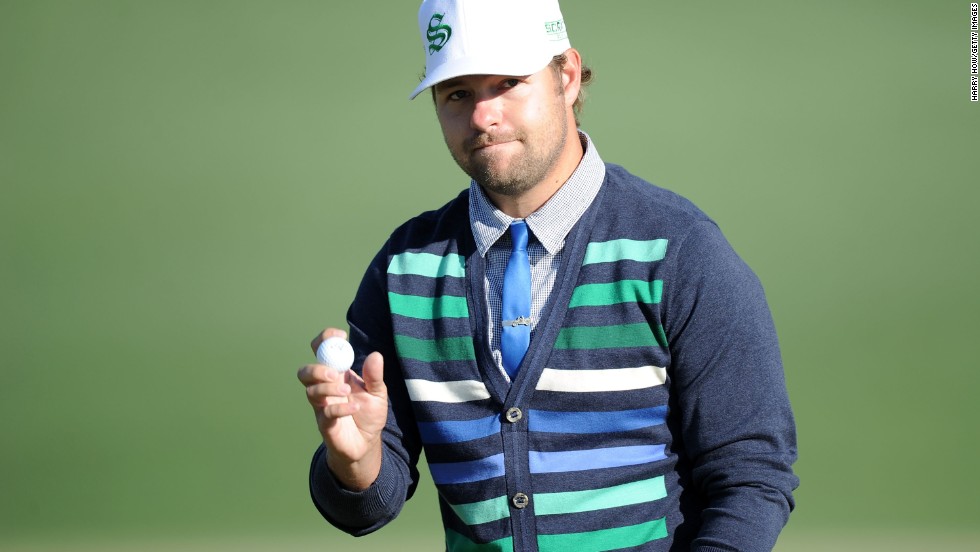 Ryan Moore, &lt;a href=&quot;http://bleacherreport.com/articles/2023504-masters-par-3-tournament-2014-results-analysis-and-twitter-reaction&quot; target=&quot;_blank&quot;&gt;who won the traditional Par 3 Contest at this year&#39;s Masters&lt;/a&gt;, is known to sport a skinny tie with a cardigan. Here, he waves to the gallery on the second green during the 2010 Masters.