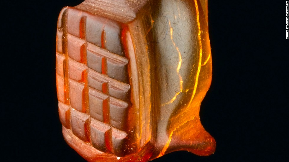 A complete amber Gladiator amulet. Seven meters of archaeology have been excavated, including remains covering the entire Roman occupation of Britain -- from the mid 40s AD to the early 5th century.