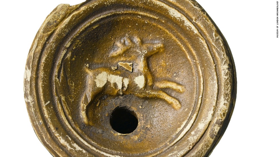 A ceramic oil lamp depicting a stag. Approximately 700 boxes of pottery fragments will be analyzed by MOLA  -- Museum of London Archaeology  -- specialists.