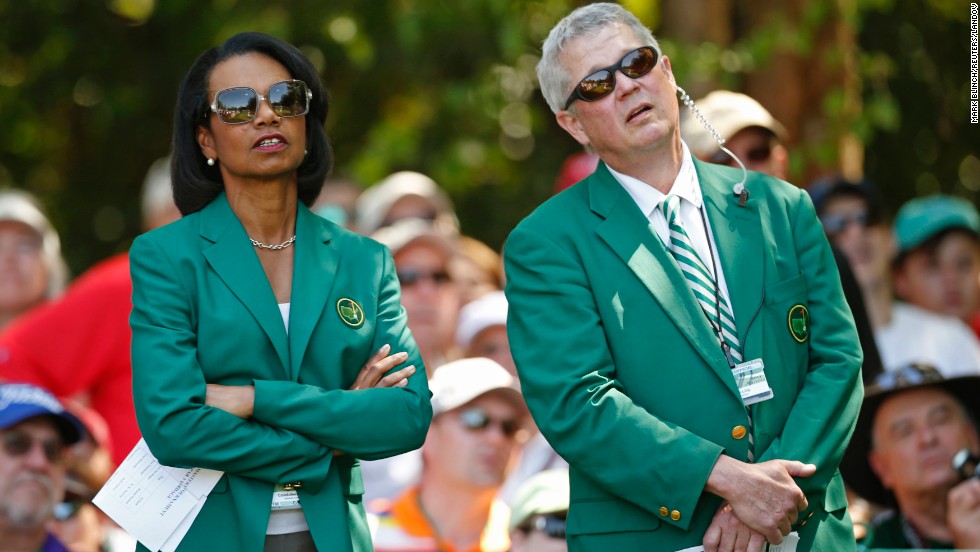 Condoleezza Rice, former U.S. secretary of state and new member of Augusta National Golf Club, looks on with member Bruce A. Lilly of Minnesota during the annual Masters Par 3 Contest.