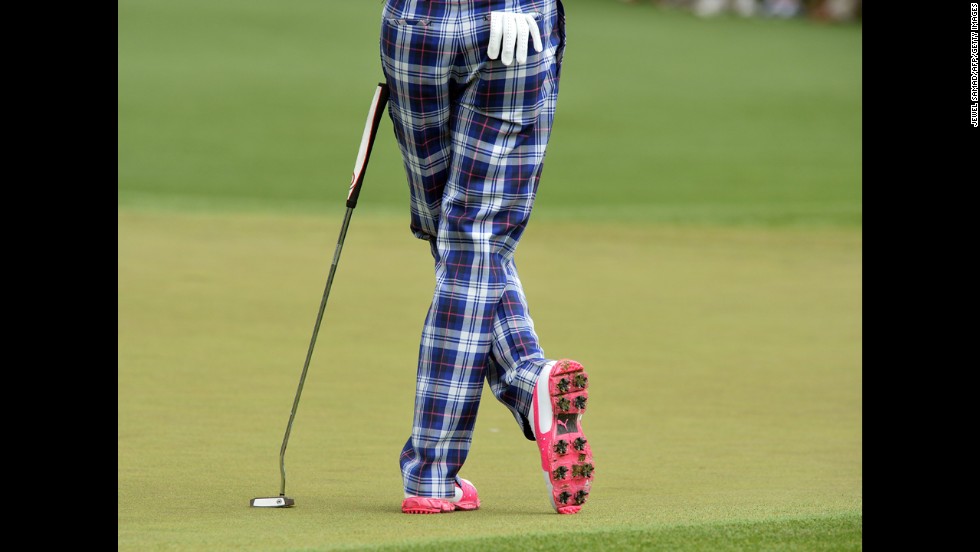 Ian Poulter of England pauses during the first round.
