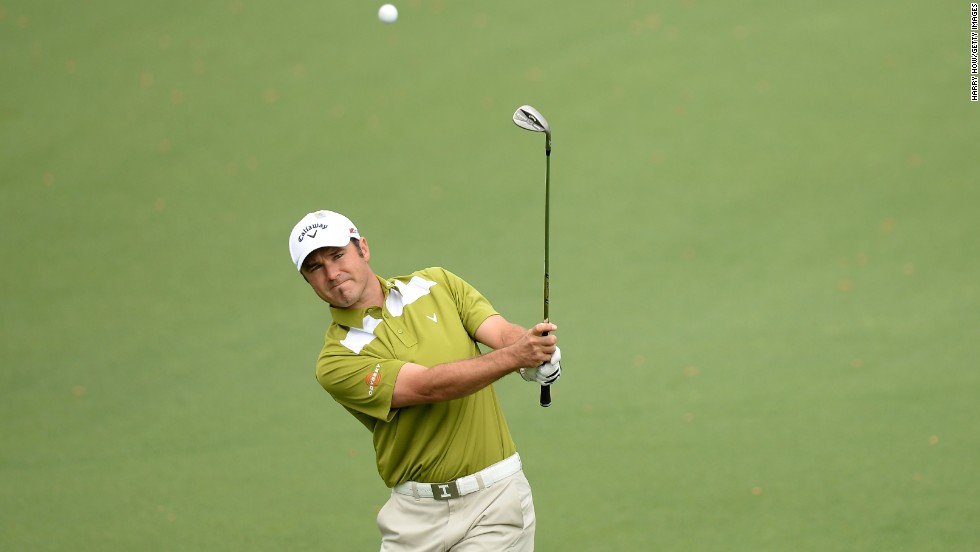 South Africa&#39;s Trevor Immelman chips onto the second green on April 12.