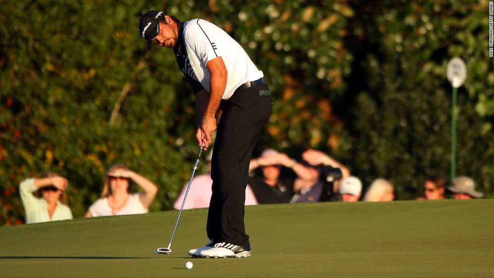 Jason Day of Australia putts on the 17th hole during the second round of the Masters.
