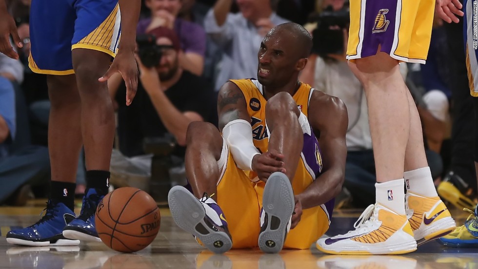 Bryant is injured in the second half while playing the Golden State Warriors on April 12, 2013. The injury took him out of the rest of the 2012-2013 season.