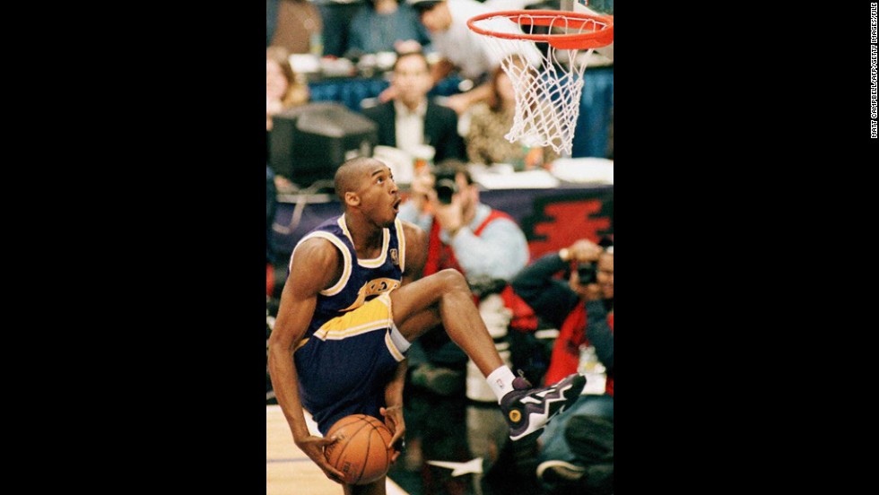 Bryant eyes the basket during the NBA Slam Dunk contest on February 8, 1997, at Gund Arena in Cleveland. Bryant is the youngest player to win the contest.