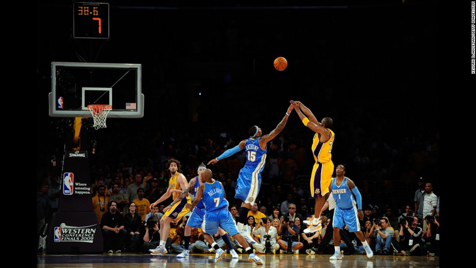 Bryant shoots a jumper over Carmelo Anthony, No. 15 of the Denver Nuggets, in the fourth quarter of game one of the Western Conference Finals during the 2009 NBA Playoffs at Staples Center on May 19, 2009. The Lakers defeated the Nuggets 105-103.