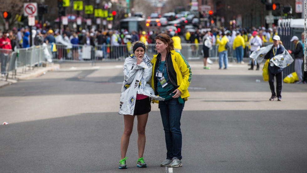 A runner is comforted following the attack.