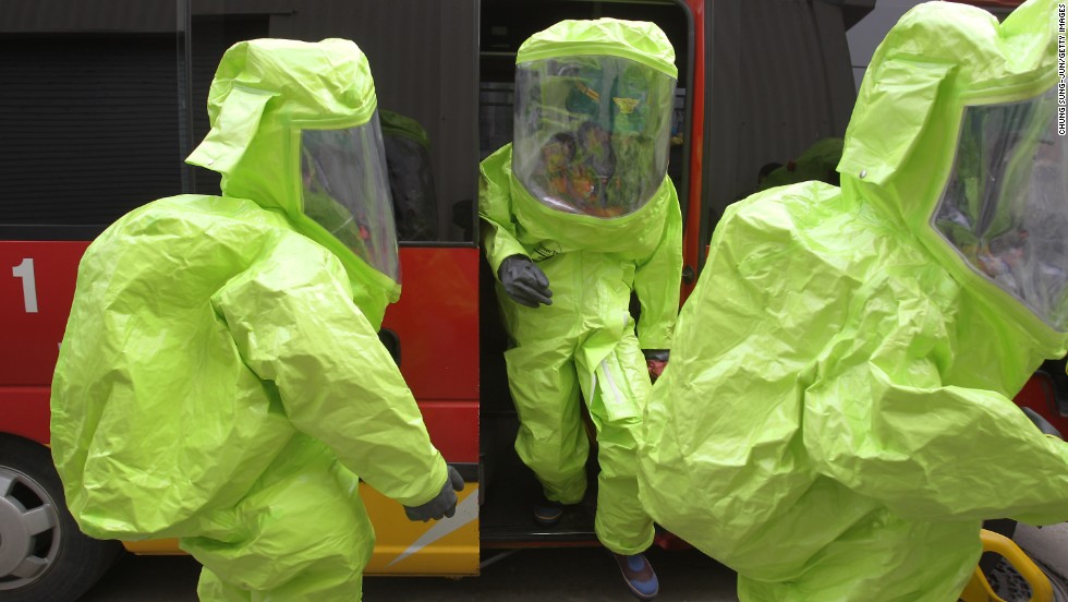 Emergency service personnel wearing chemical protective clothing participate in an anti-chemical warfare exercise on Tuesday, April 16 in Seoul. Tensions remain high in the Korean Peninsula in the wake of North Korea&#39;s recent nuclear threats and provocations. A Pentagon intelligence assessment suggests the North may have the ability to deliver a nuclear weapon with a ballistic missile, though the reliability is believed to be &quot;low.&quot;