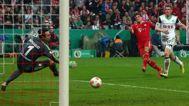 Mario Gomez fires home as Bayern Munich continued their march towards the German Cup title