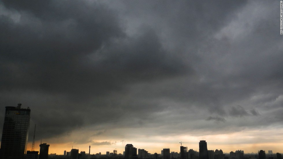Dark clouds hang over the Indonesian capital of Jakarta on April 18.