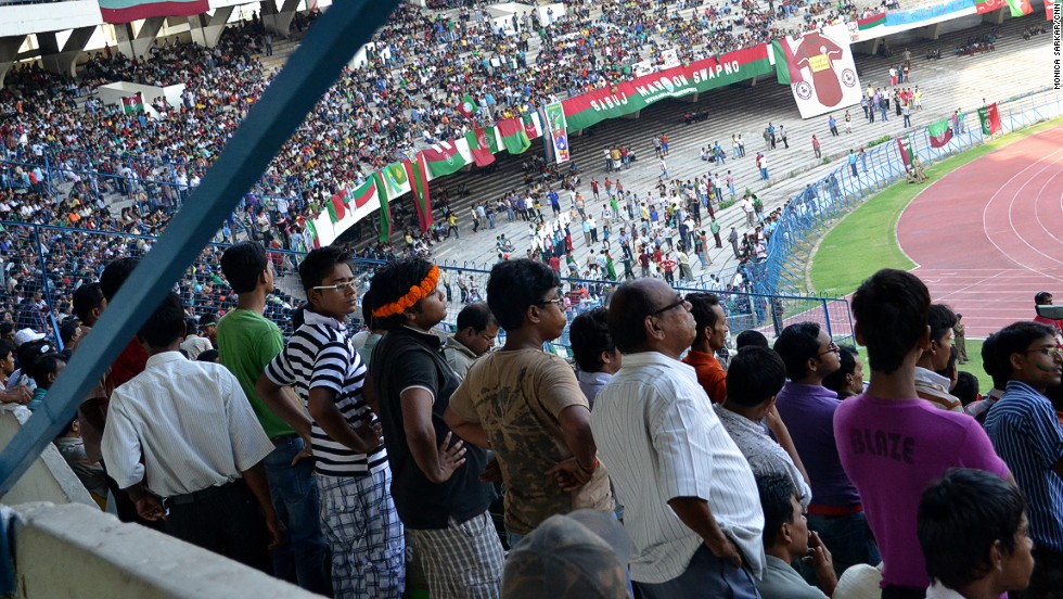 Kolkata&#39;s Saltlake football stadium is one of the largest in Asia, with a capacity of 120,000. Pictured here, supporters of the oldest team in the country -- Mohun Bagan A.C. -- watch their team play an I-League match against Pune F.C in May 2012. Kolkata is the birthplace of Indian football, with British soldiers introducing the sport in the 19th century.